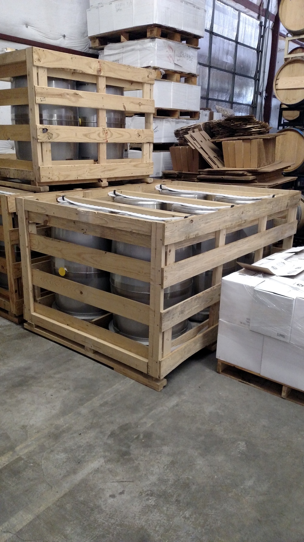 Newly arrived stainless barrels still in their crates